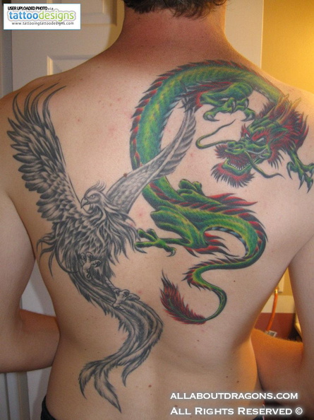 0910-900_phoenix-and-dragon-by-mrsultan-rihanna-tattoo-1908823890.jpg